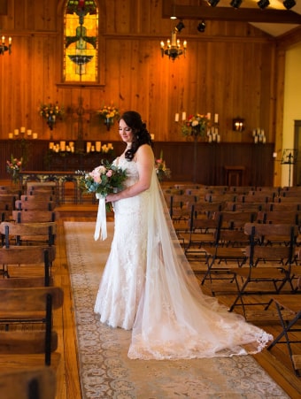 A beautiful wedding ceremony taking place at the chapel of an inn.